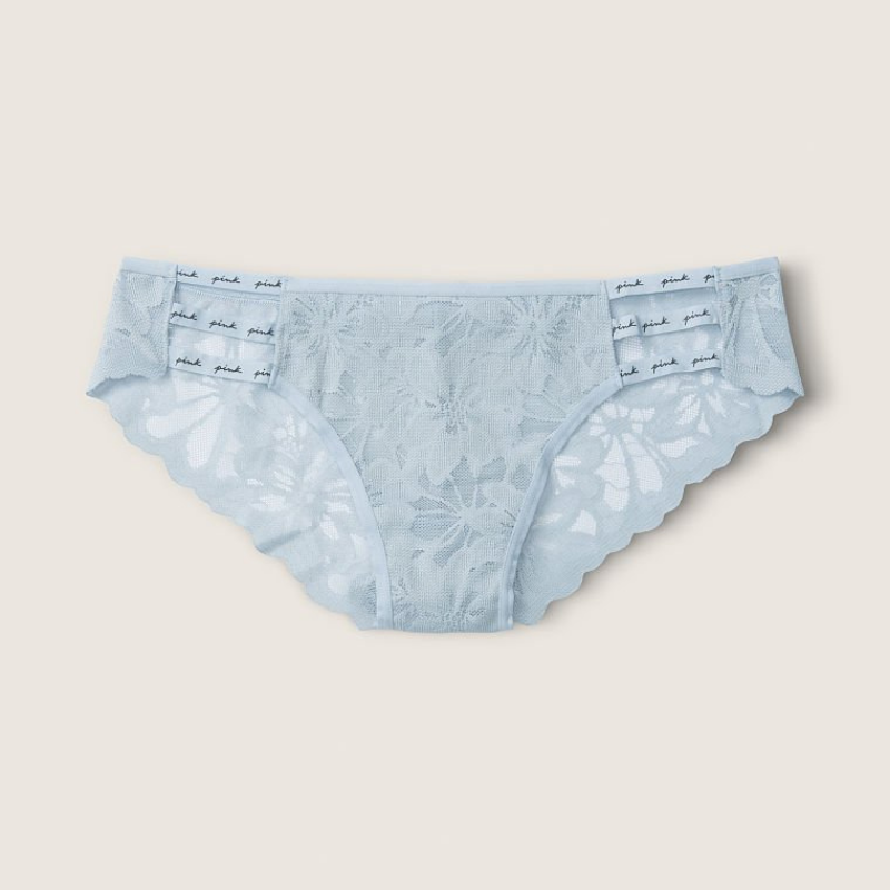 Cheekini de encaje con tiras y logo